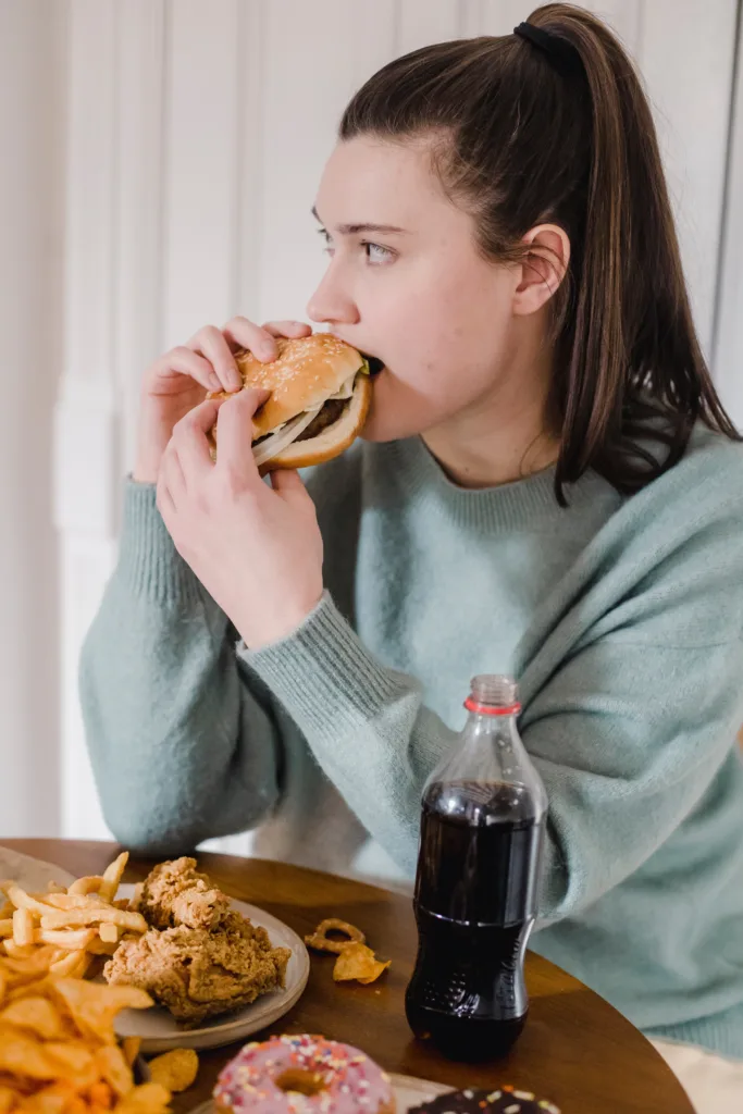 a girl drinking soda