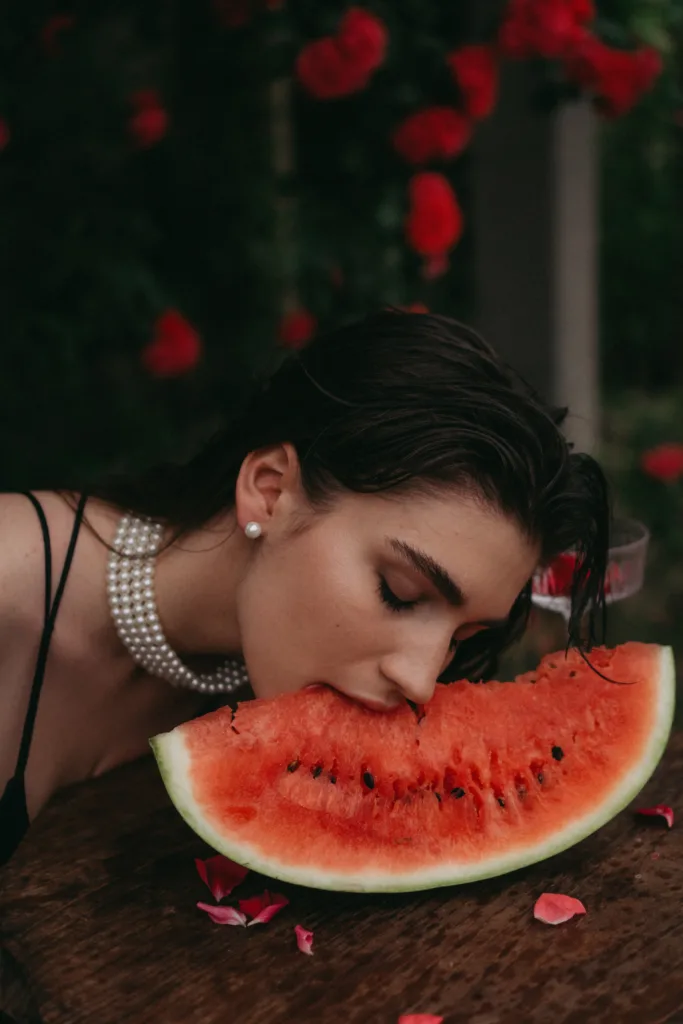 women eating watermelon