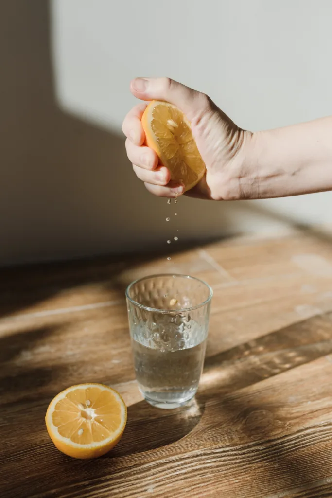 Squeeze Lemon in glass